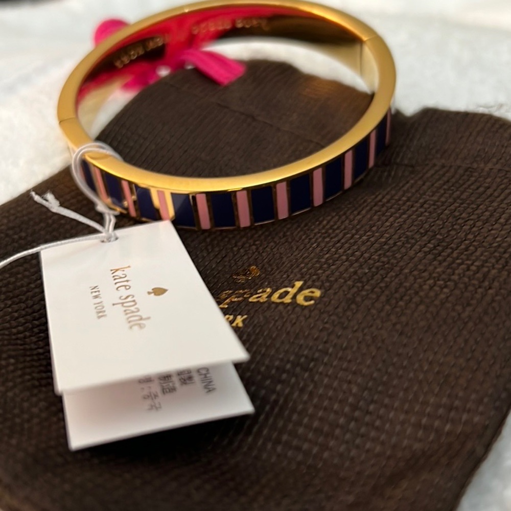 Boutique item not outlet 
2015 NWT Katespade iodine multi navy and pink bangle